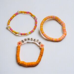 Three. Pack of bracelets.